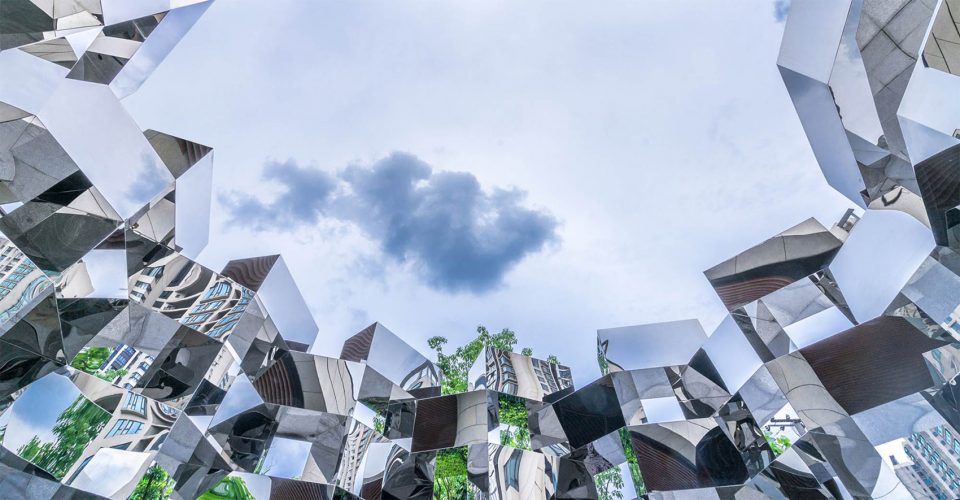 View from inside Ring • Chain looking up at sky and clouds framed by the mirrored cubes